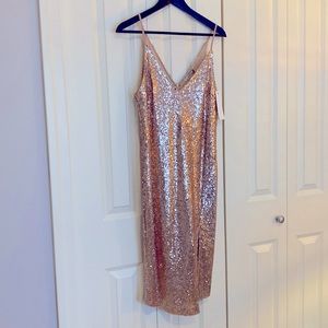 Sequinned mini party dress. Never worn. Size M.